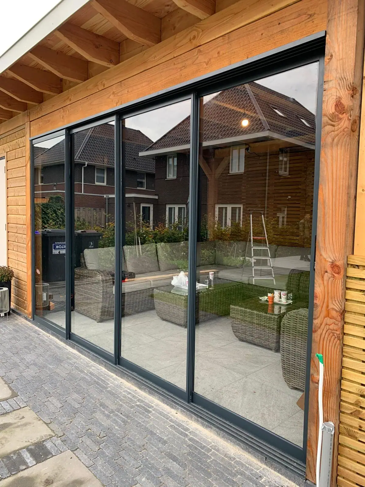Schiebewand in einem Gartenzimmer aus Lärche, Foto 2